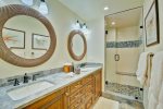 Guest Bathroom  features double Vanities and Shower 